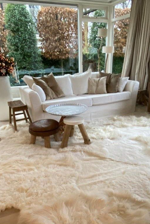 Monroe Life Knokke - schapenvachten, schapentapijten, patchwork schapenvellen op maat - Zustermerk van Oscar Candles door Marc Lendfers